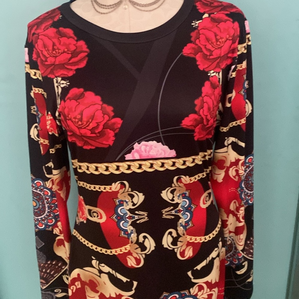 Ladies long sleeve dress. Sheath style/long sleeves. Multi colored.